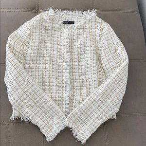 Never worn, making space in my closet.